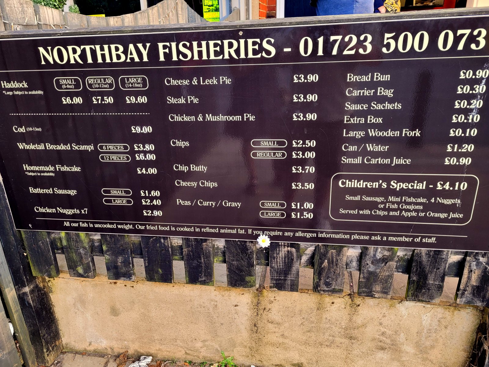 The menu board inside the shop